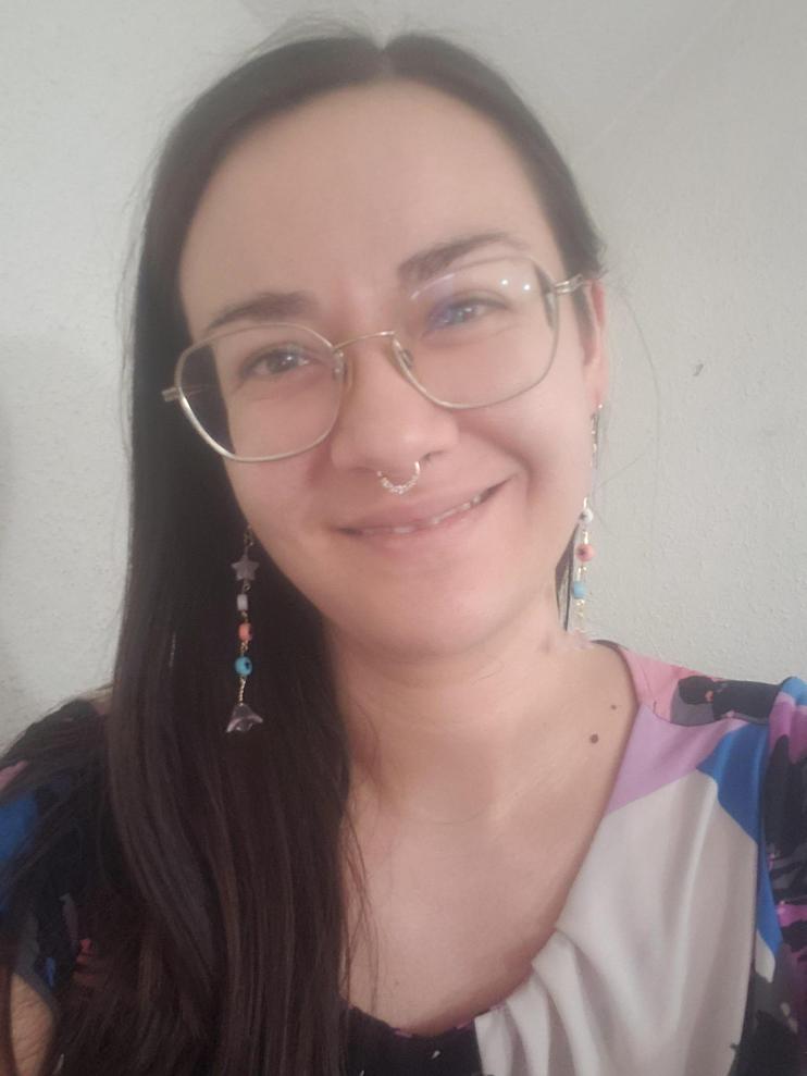 female candidate speaking microphone